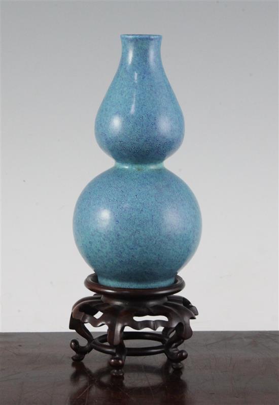 A Chinese robins egg glazed double gourd vase, late 18th century, 15.5cm, wood stand